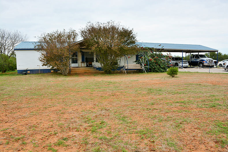 Photo #1 of front view of manufactured home located on IH 35 West Side Frontage Road, Dilley, TX