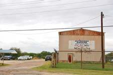 Photo #1 of end view of metal building on property located on IH 35 West Side Frontage Road, Dilley, TX