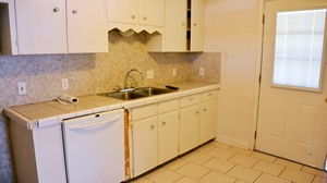 Kitchen in wood frame residential house located at 903 Live Oak, Cotulla, TX